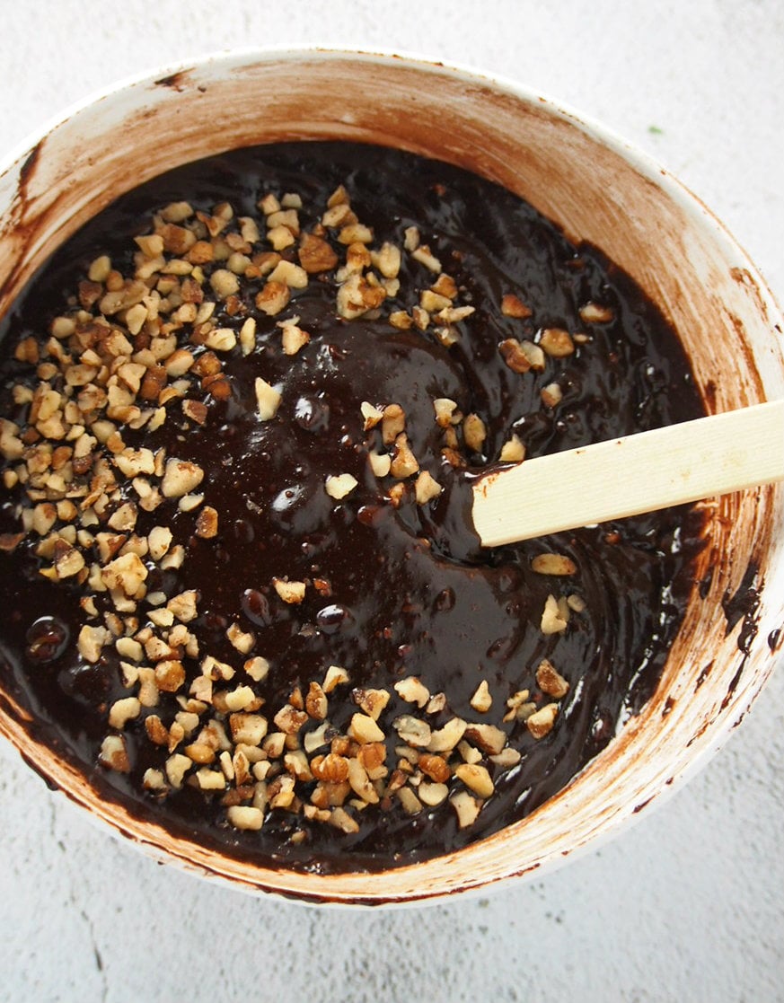 The brownie batter, all mixed up in a bowl and ready to be poured out on a baking pan.