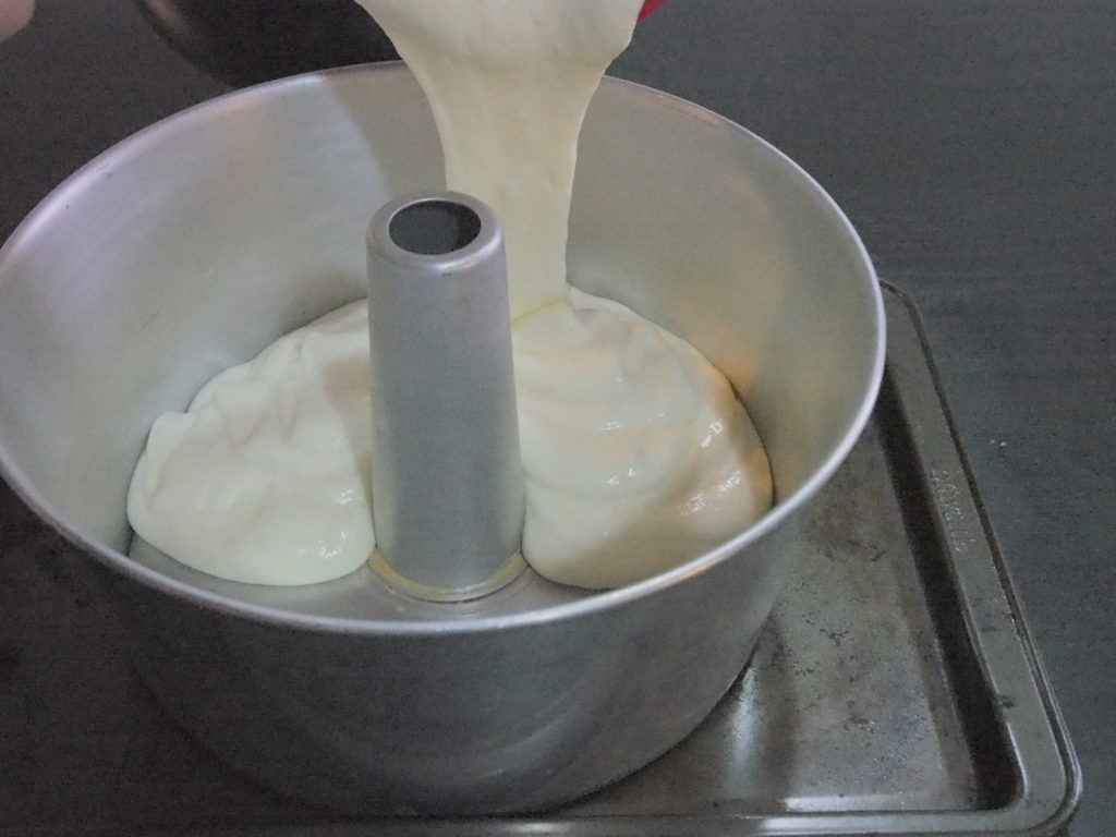 pour batter in a tube pan