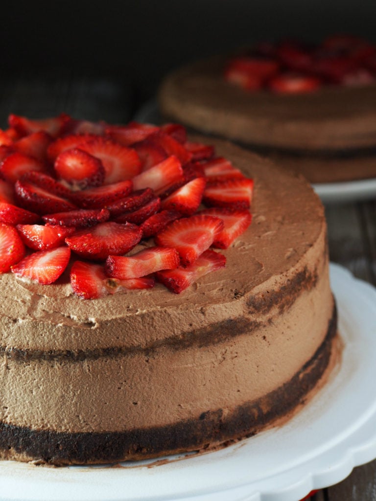 An easy chocolate cake recipe frosted with whipped chocolate cream.