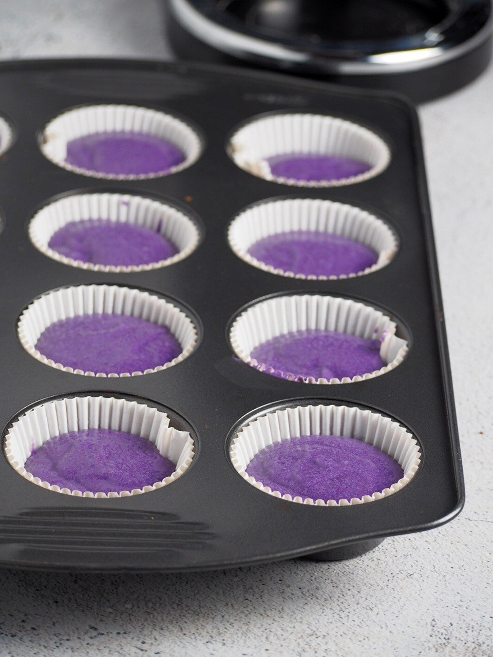 The ube cupcakes ready for the oven.