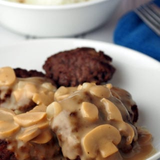 \this burger steak with mushroom gravy is a tasty dish perfect with mashed potato or rice.