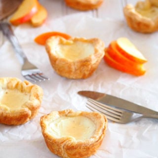 These delightful egg tarts are made of cheesy and creamy egg whites custard and nestled into light, flaky and buttery puff pastry crusts. These little treats are delicate, melt in your mouth bites with a very buttery crisp touch from the puff pastry.