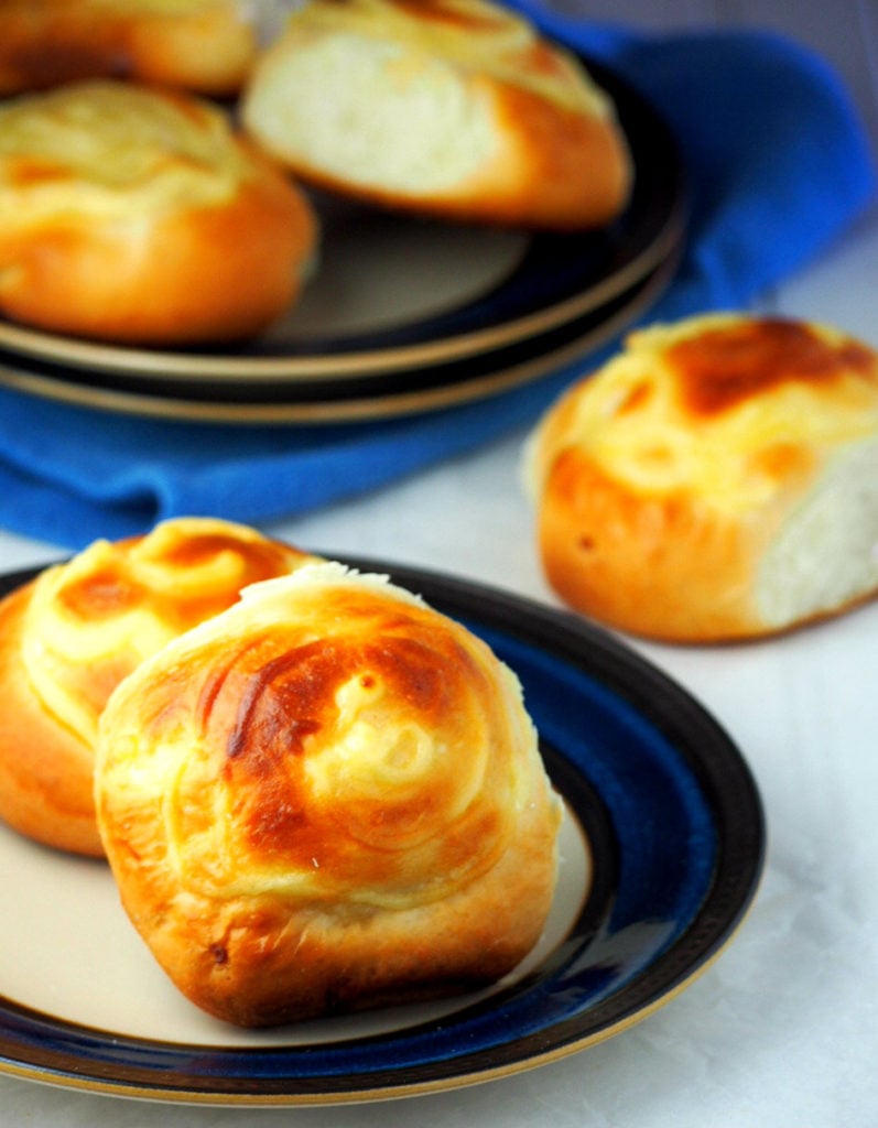 Custard buns are soft milk bread filled with creamy custard in the center.