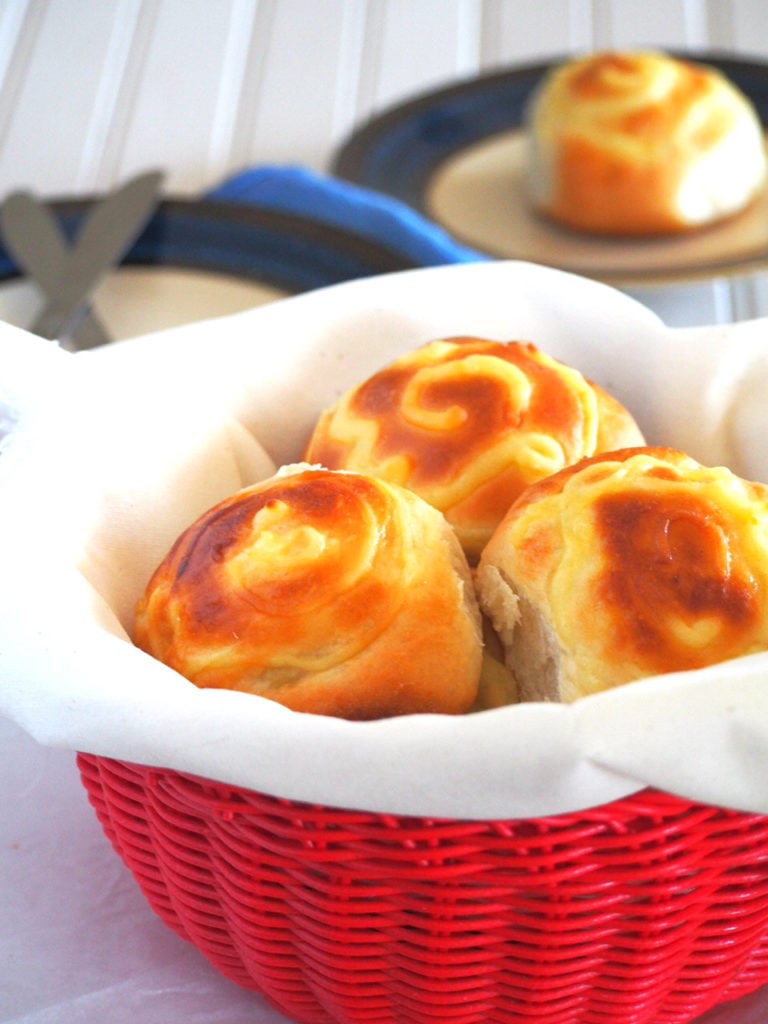 Custard buns are soft milk bread filled with creamy custard filling in the center.