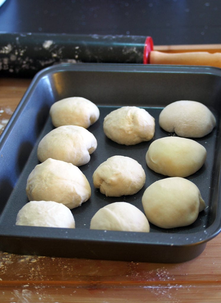 Custard buns are soft milk bread filled with creamy custard in the center.