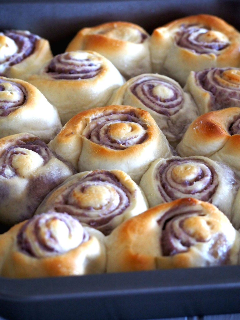 Ube bread rolls are soft rolls of bread filled with creamy and buttery ube ( purple yam).
