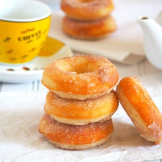 These baked cinnamon sugar donuts are soft, chewy and delightfully sweet. Try baking these simple donuts and have fresh, warm dessert ready as you wish.