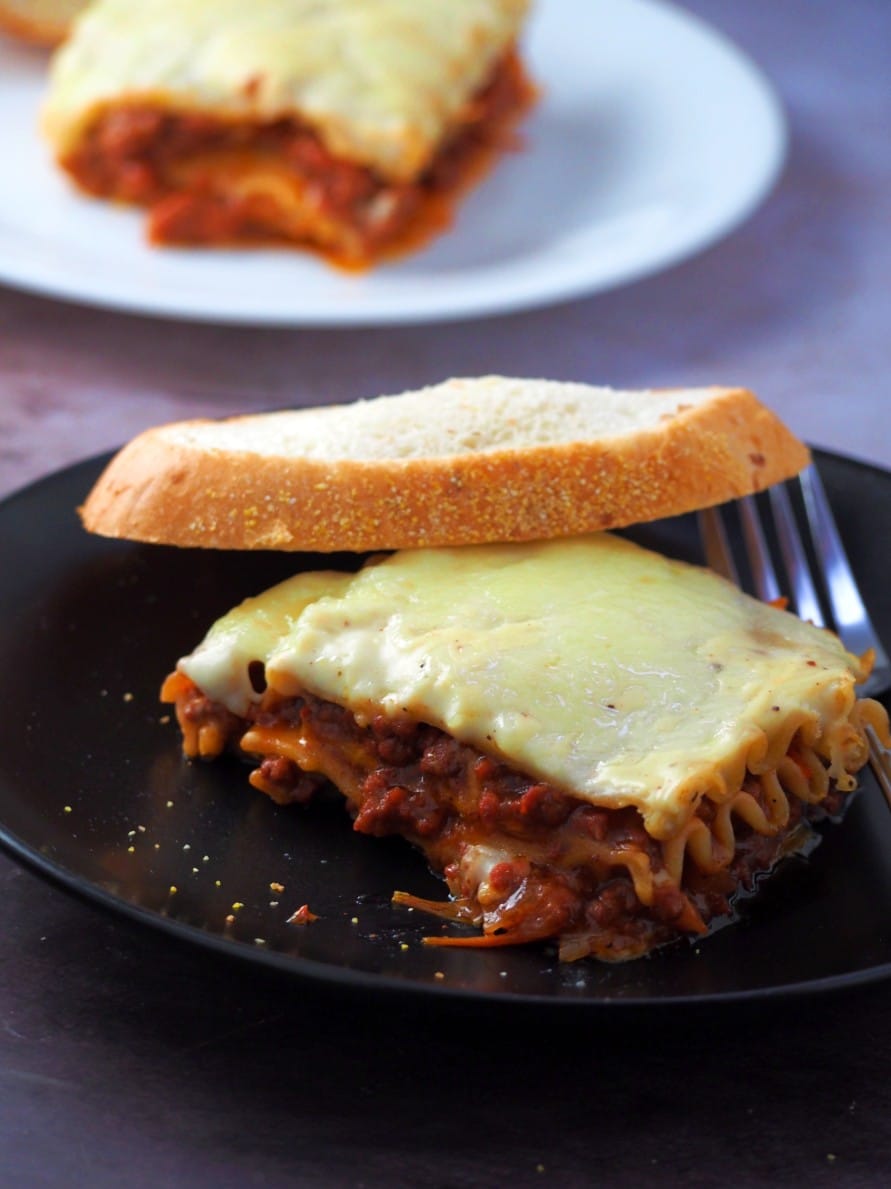 Lasagna slice on a serving plate.