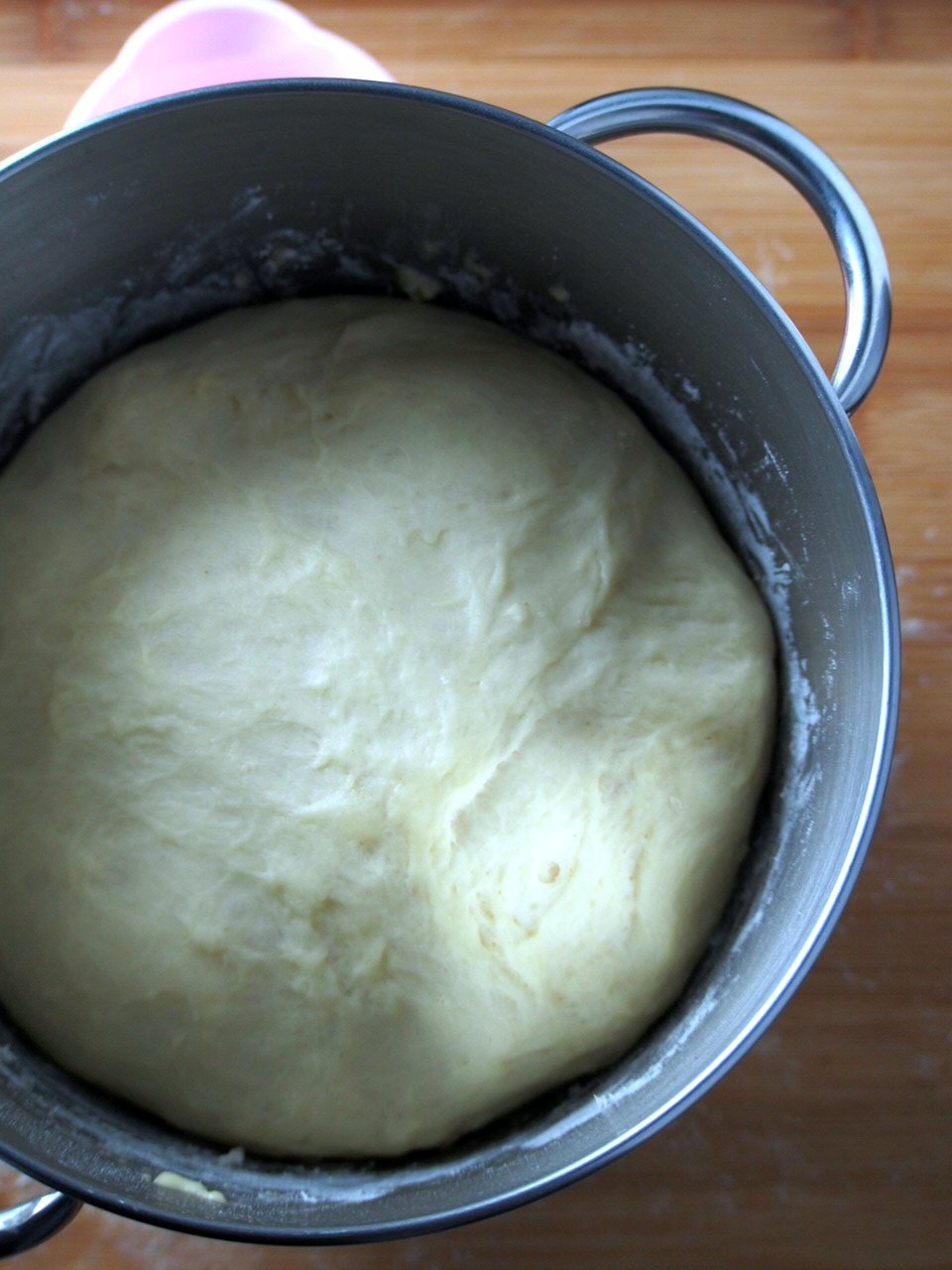 The dough for honey buns after rising.