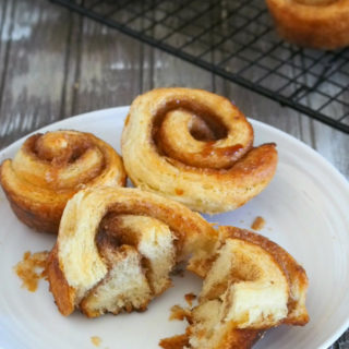 These morning buns are flaky and buttery croissants rolled with flavorful filling of cinnamon, sugar, butter and orange zest. They are amazing snacks, breakfast or desserts.