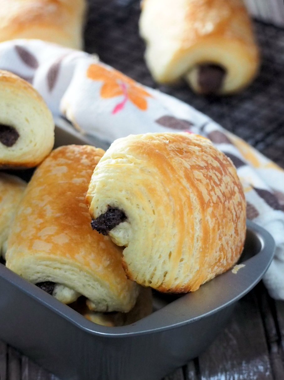 Enjoy warm Chocolate Croissants right at your own home. Making these flaky and buttery pastries will greatly reward you with a feeling of accomplishment and whole tray of irresistible chocolate hazelnut goodness.