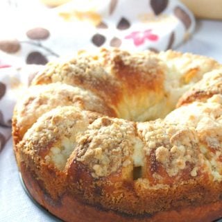 Croissant Cinnamon Roll Cake make the perfect breakfast with buttery layers of dough filled with cinnamon sugar, then topped with crisp streusel toppings.