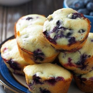 These Blueberry Muffins are delectable bites of melt in your mouth cake crumbs with a hint of freshness from the soft berries.
