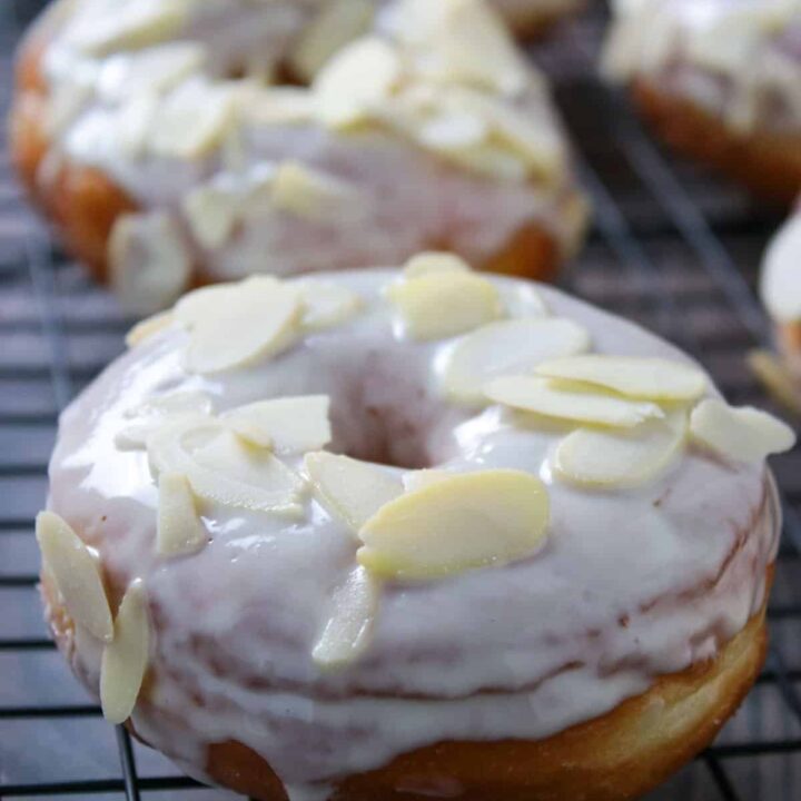 Close up shot of a white chocolate yeast donut.