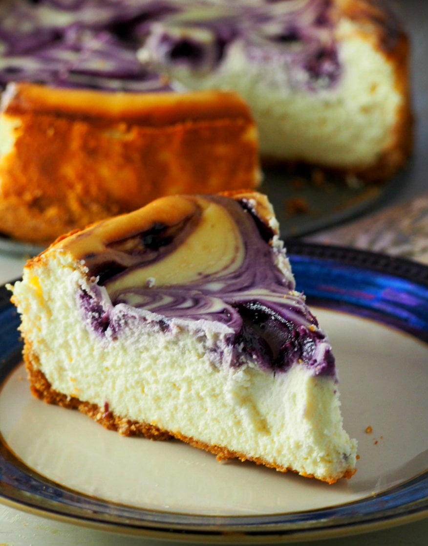 With blueberry swirls and a generous drizzling of blueberry syrup upon serving, this Blueberry Cheesecake is just the perfect one you will ever need! 