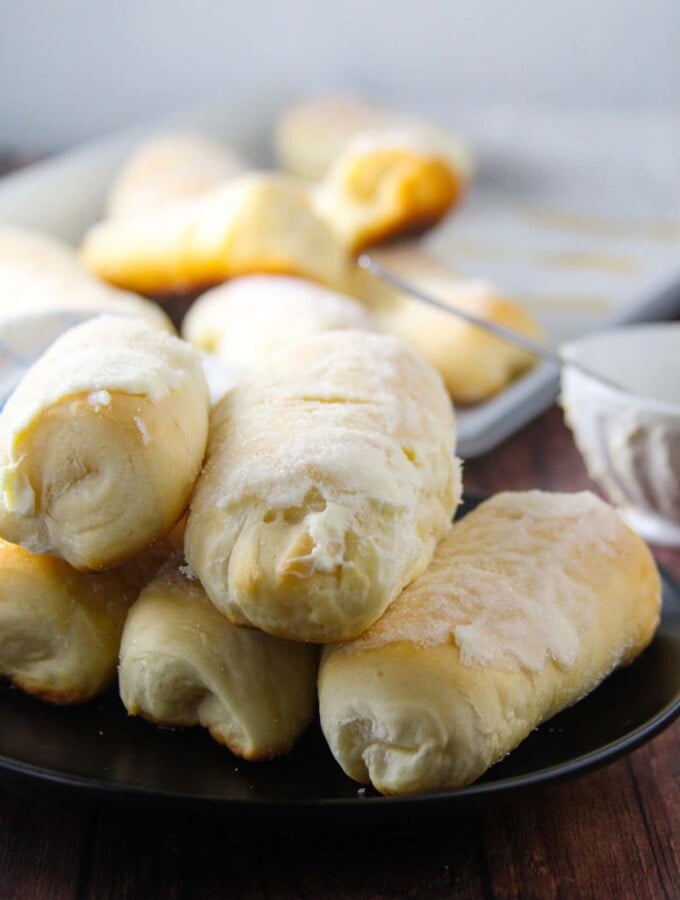 Sweet cheese rolls on a small plate.