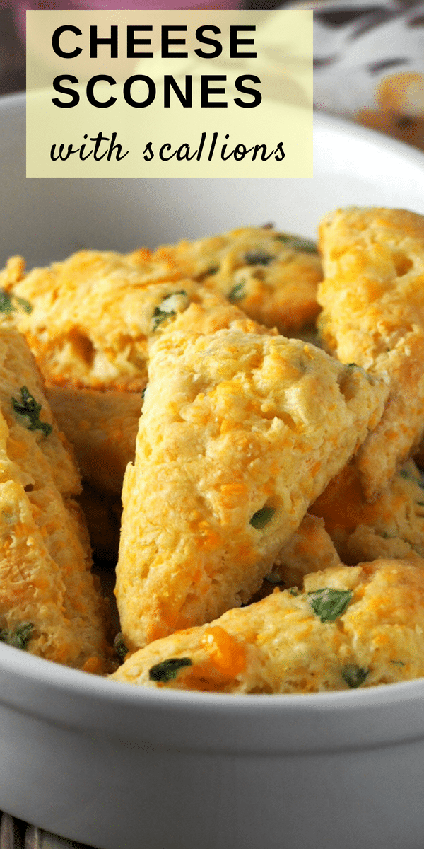Cheesy and buttery with a good savory flavor, these Cheese Scones with Scallions are a nice treat for your breakfast or as a side dish to your meal. #cheese #scones #scallions #pastry #breakfast #biscuits #savoryscones