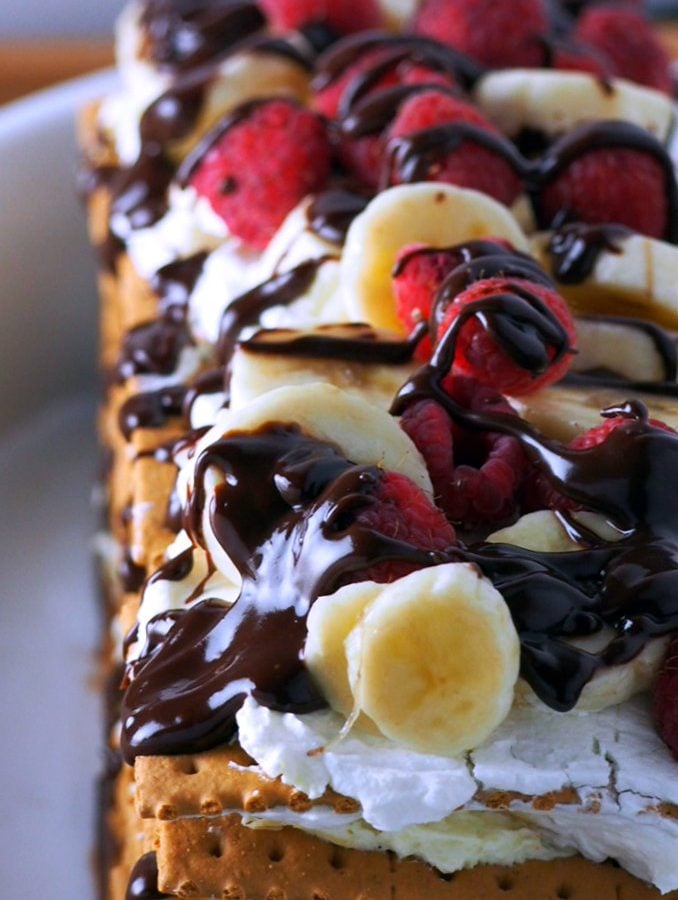 Enjoy the classic banana split in this easy, no-bake dessert in cake form. Banana Split Icebox Cake-all you need are graham crackers, some whipped topping and sour cream, bananas and jello pudding. Have fun assembling!