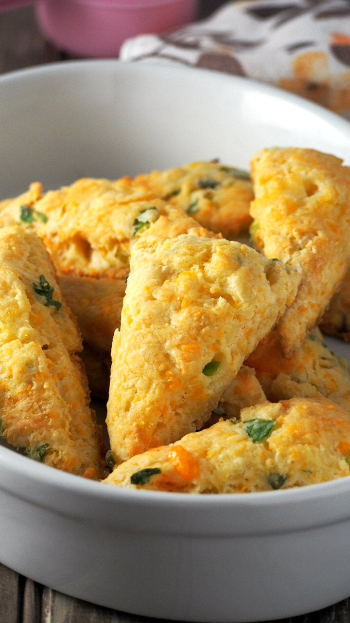 Cheesy and buttery with a good savory flavor, these Cheese Scones with Scallions are a nice treat for your breakfast or as a side dish to your meal. 