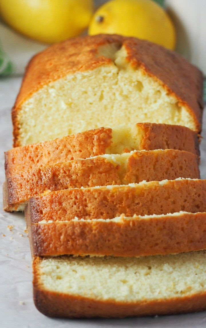 Lemon Loaf cake is sliced and ready to be served.