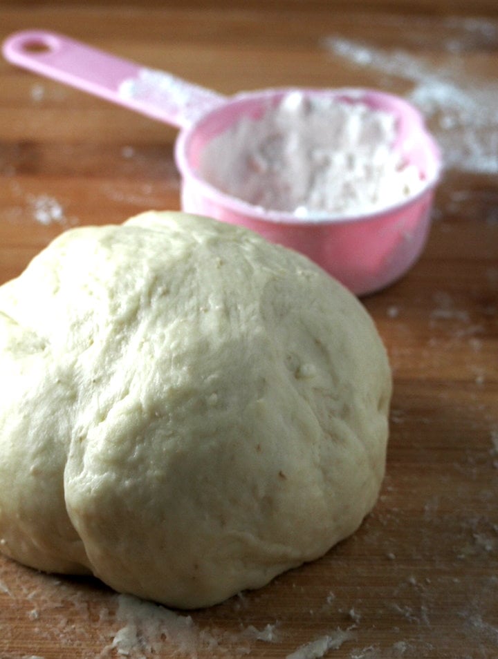 The kneaded dough, shaped into a ball. 