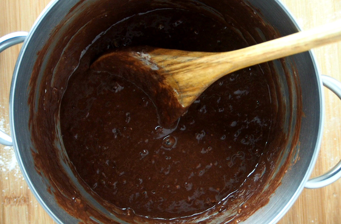 Smooth Chocolate dough batter after the cocoa and and some flour is mixed in.