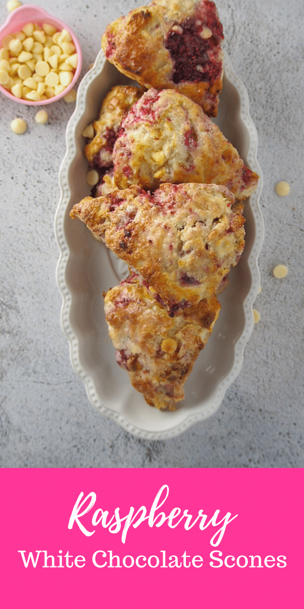 Raspberry White Chocolate Scones! Tender-crisp crumbs, bright berry flavor and the sweet white chocolate all meld together in these extra special breakfast scones. #scones #raspberries #whitechocolateScones | Woman Scribbles