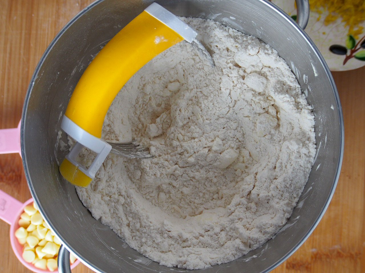 Cutting the butter in the dry ingredients to make the scones dough.
