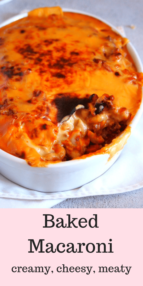 This Cheesy Baked Macaroni is meaty, creamy and tasty- all covered in a heavenly cheese sauce and baked until tasty and melted. Yum! #pasta #macaroni #cheesybakedmacaroni