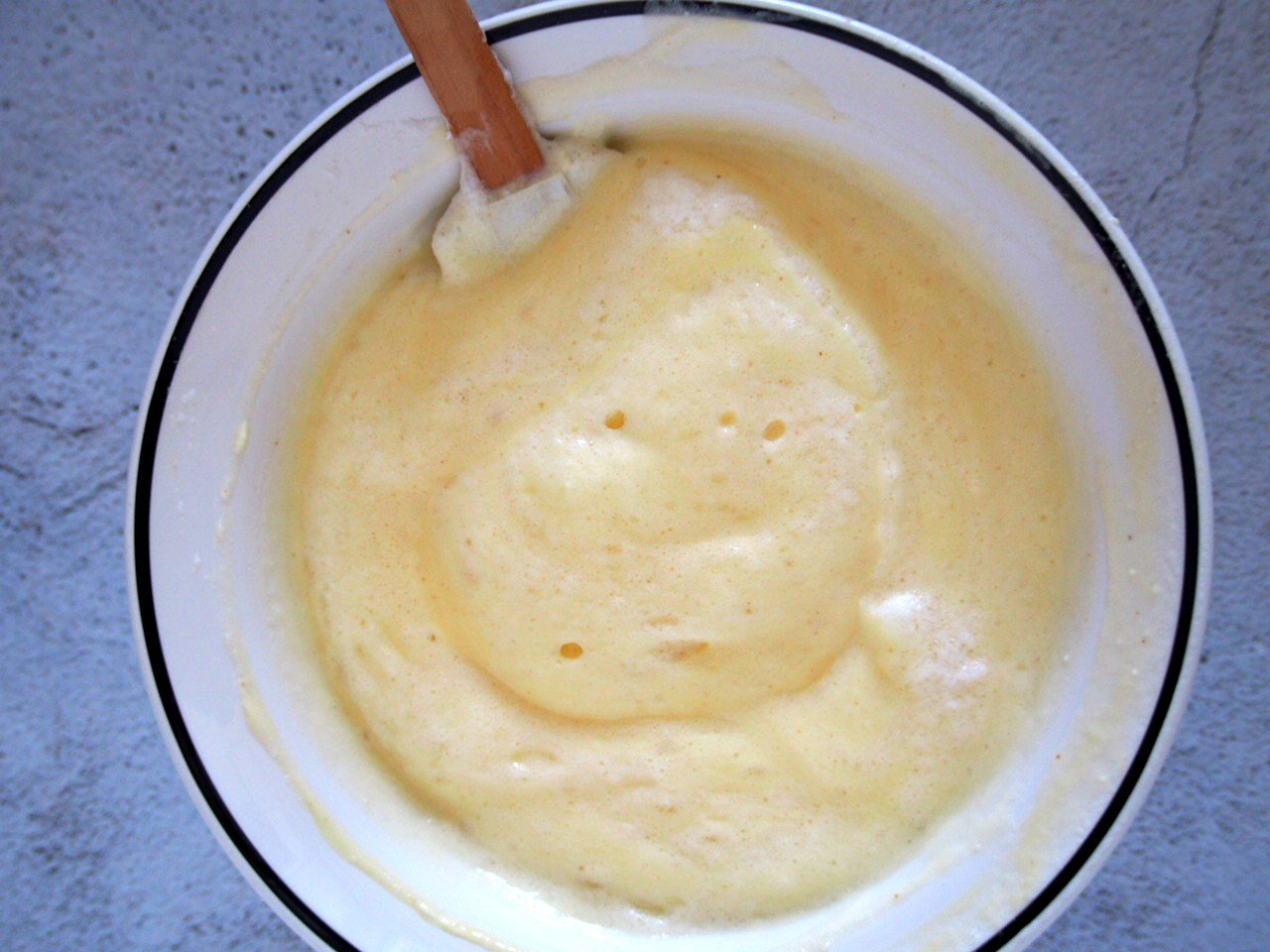 Final mixed batter of goat cheese souffle before baking.