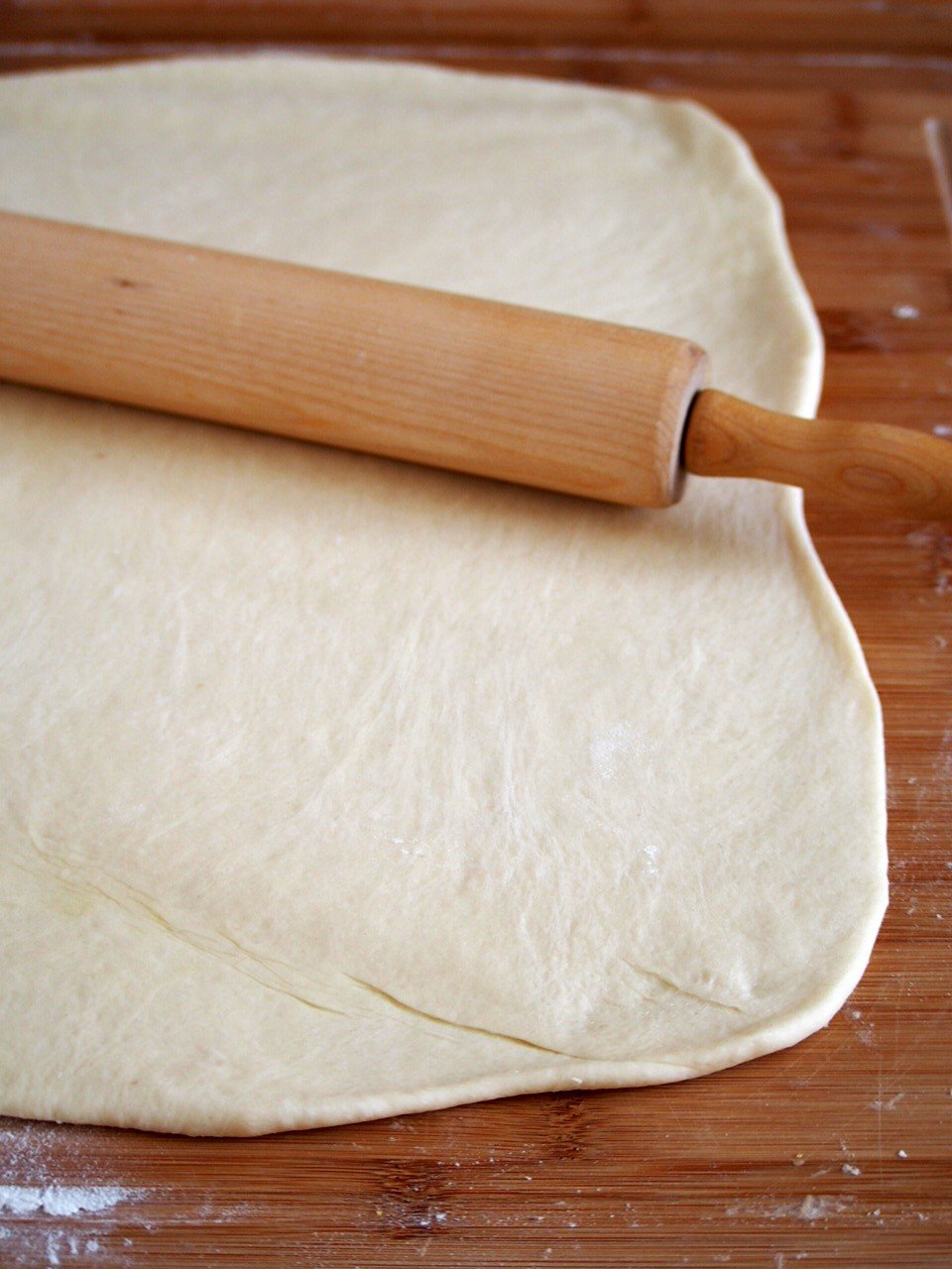 The Cinnamon Roll dough rolled into a rectangle.