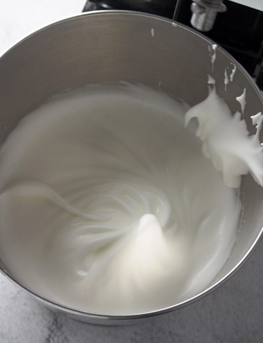 The egg whites, whisked to stiff peaks on a stand mixer.