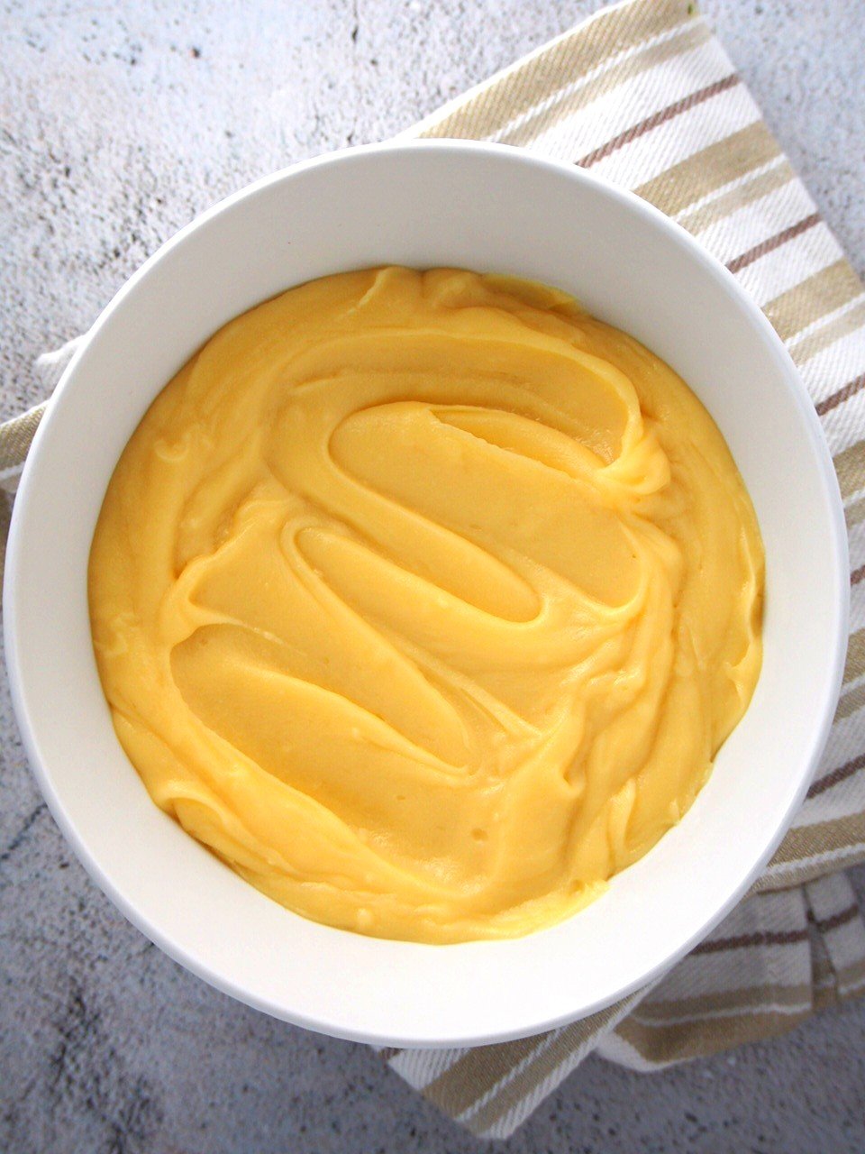 The yema (condensed milk) frosting in a bowl.