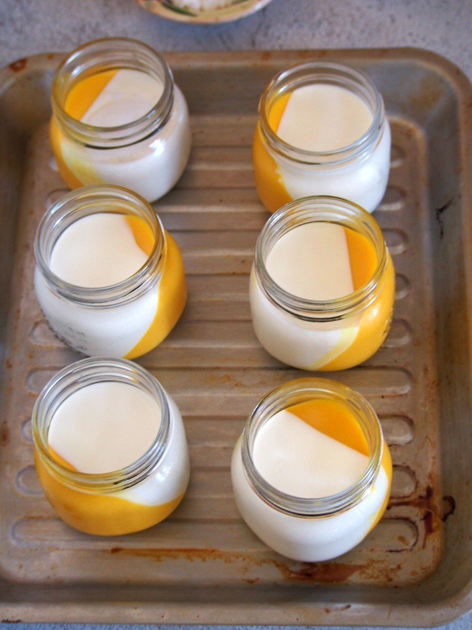 The coconut mango panna cotta all set and ready for the toppings.