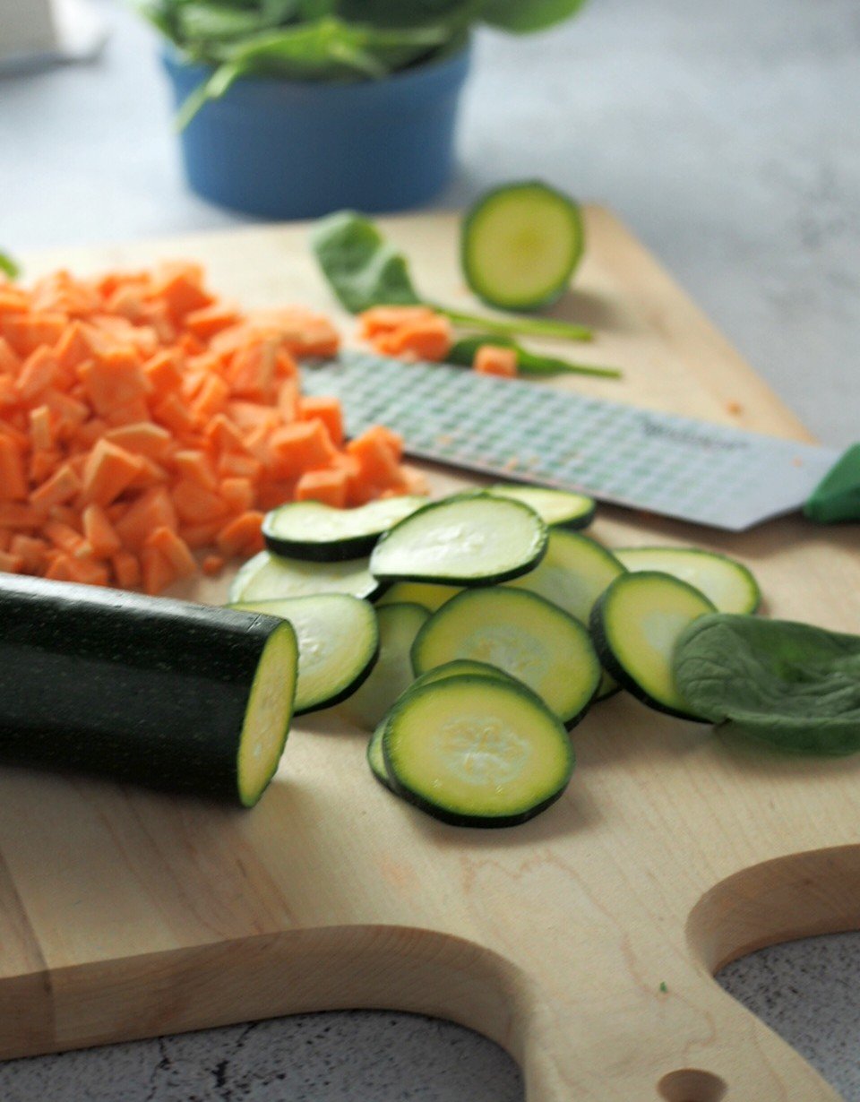 The zucchini and sweet potatoes-making the vegetable egg breakfast casserole.