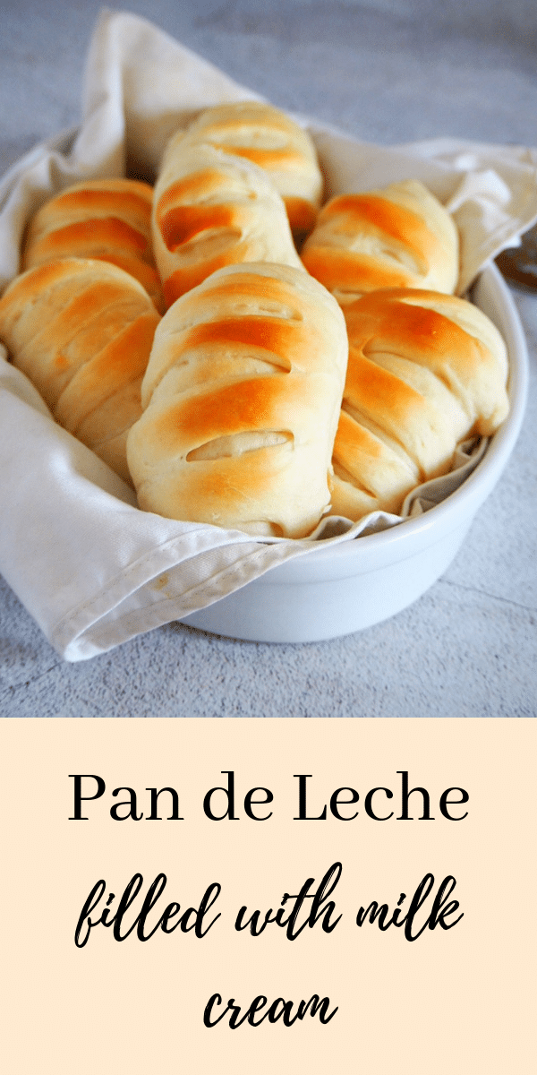 Soft and fluffy buns filled with a creamy and smooth milk cream, you are going to love this Pan de Leche for an indulgent bread treat. #milkybread #PanDeLeche #buns