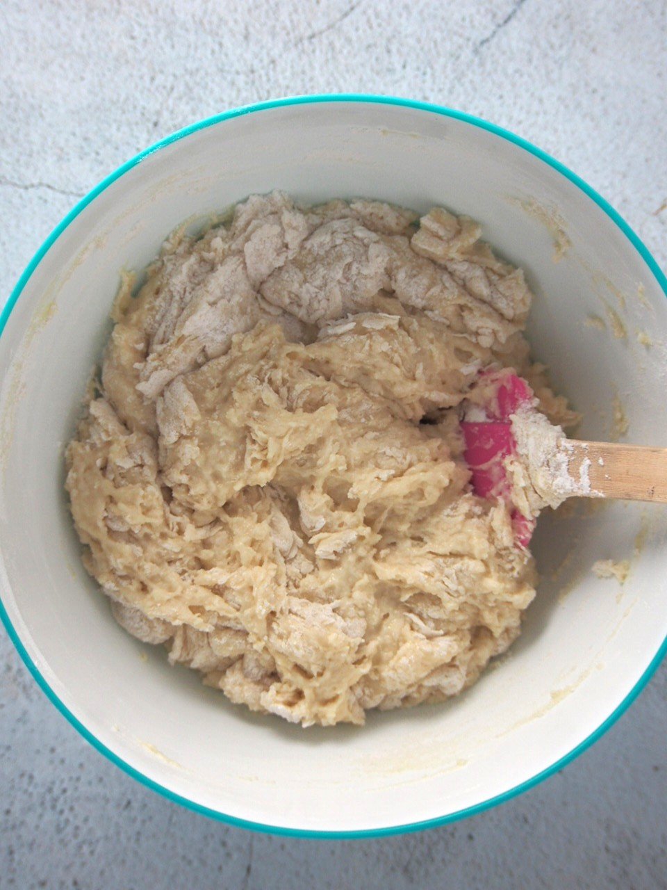 Mixing the mallorca dough ingredients in a bowl.