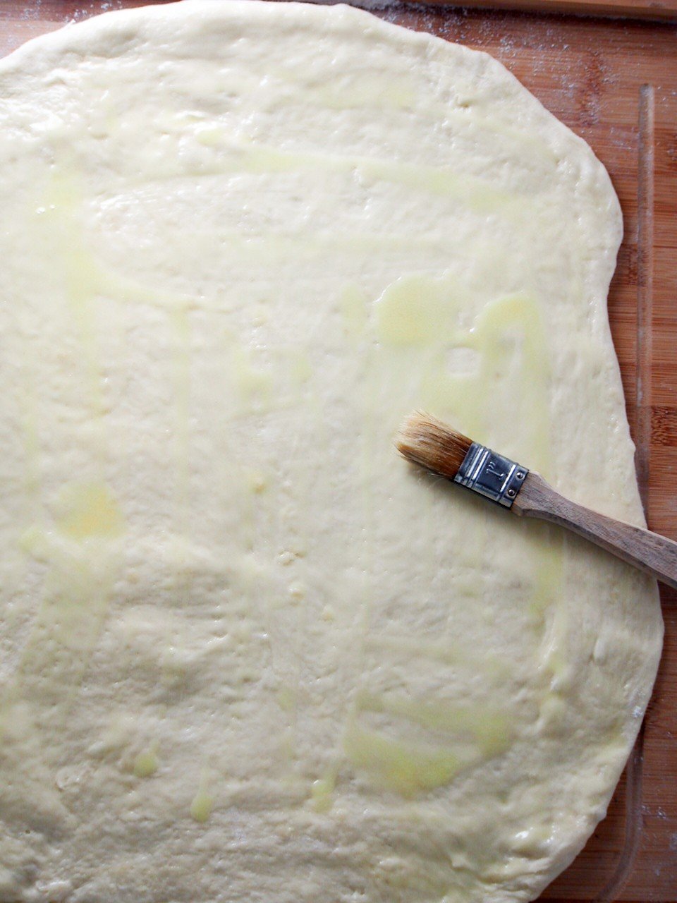 The mallorca dough rolled into a rectangle.