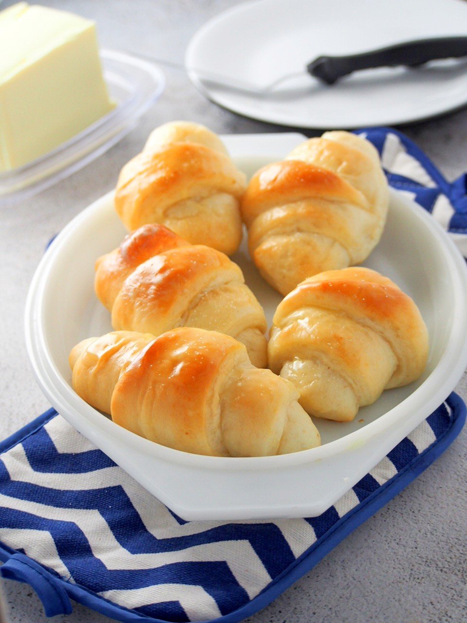 Salted butter rolls served on the table.
