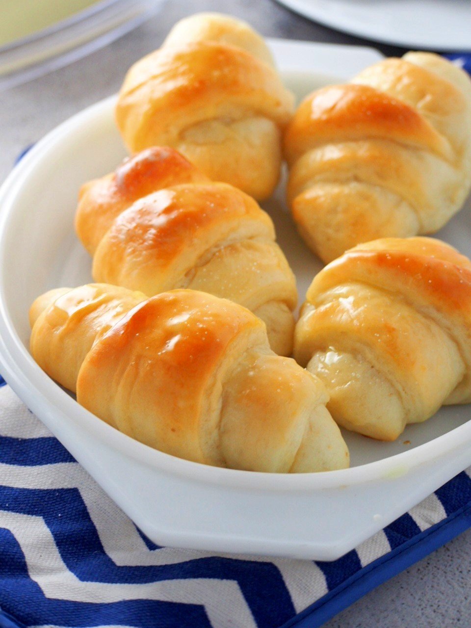 Salted Butter Rolls in a serving dish.