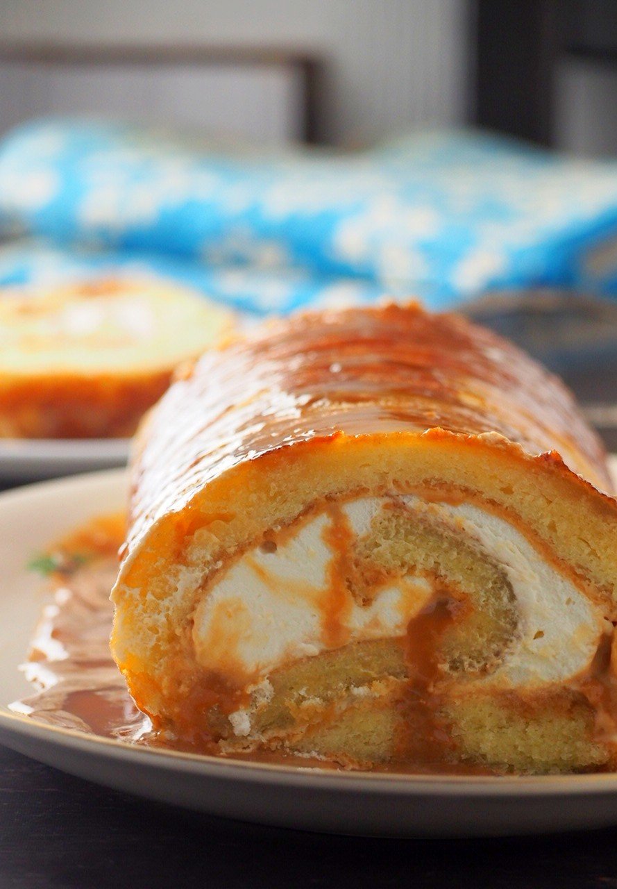 Close up shot of dulce de leche cake roll in a plate.