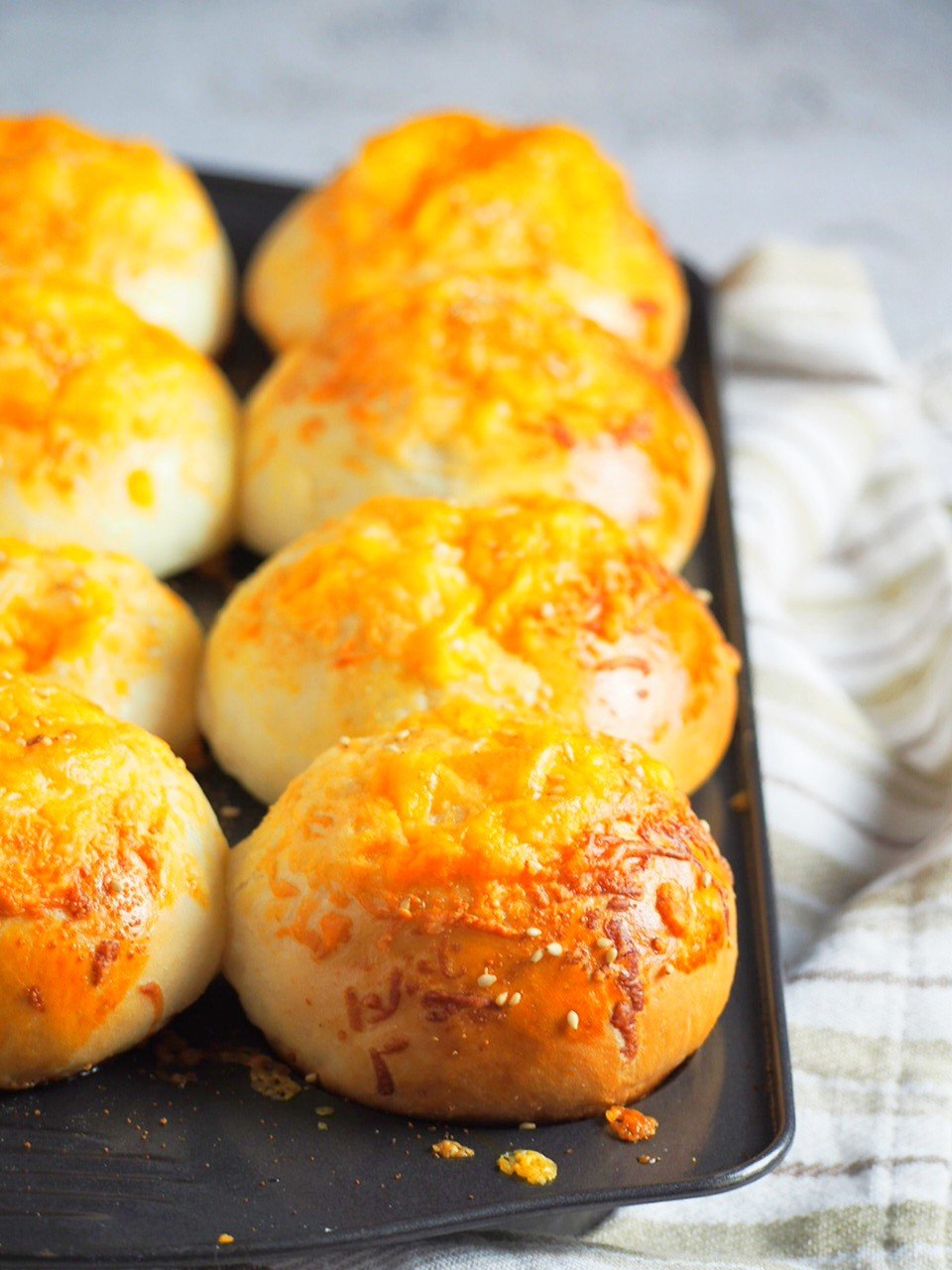 Cheese Buns on a muffin pan, fresh from the oven.