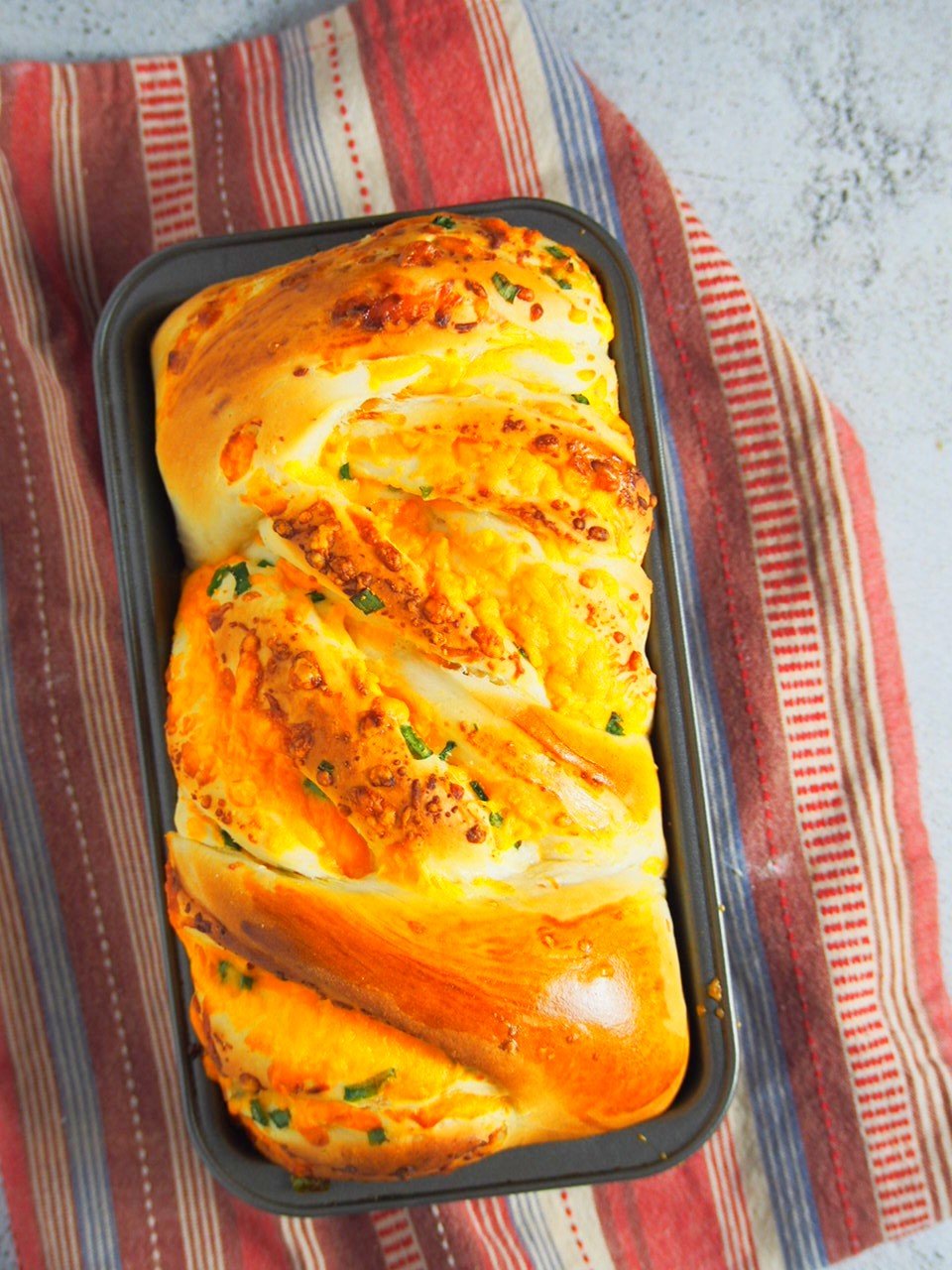 Top angle shot of cheese loaf bread.