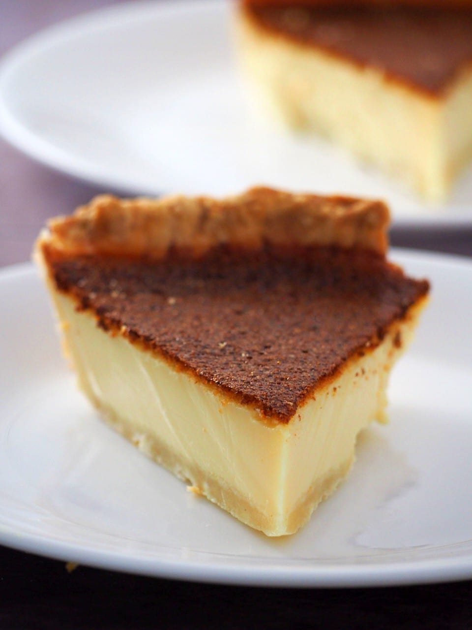 Close up of a slice of egg pie.