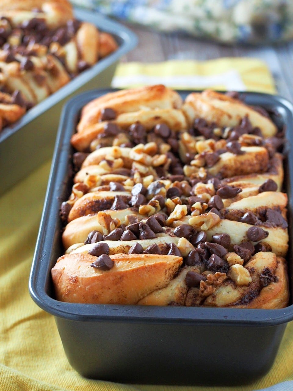 Close up view of pull-apart cinnamon milk bread in a loaf pan.