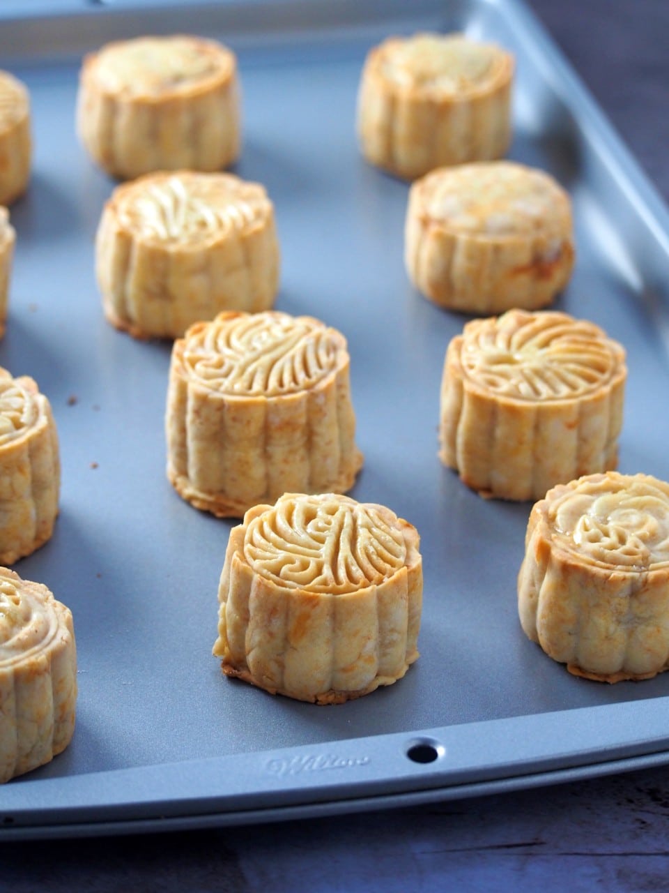 Moon Cakes on a baking pan.
