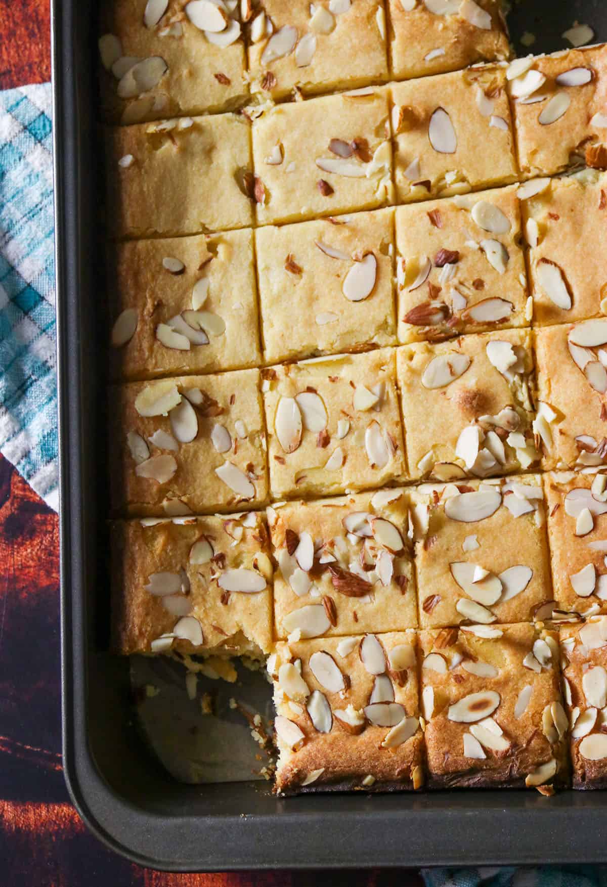 The sliced caramel bars in a baking pan.