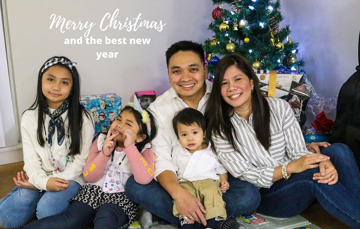 Family photo under the Christmas tree.