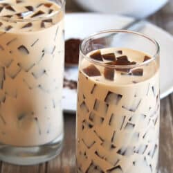2 tall glasses of Coffee Jelly in a table.