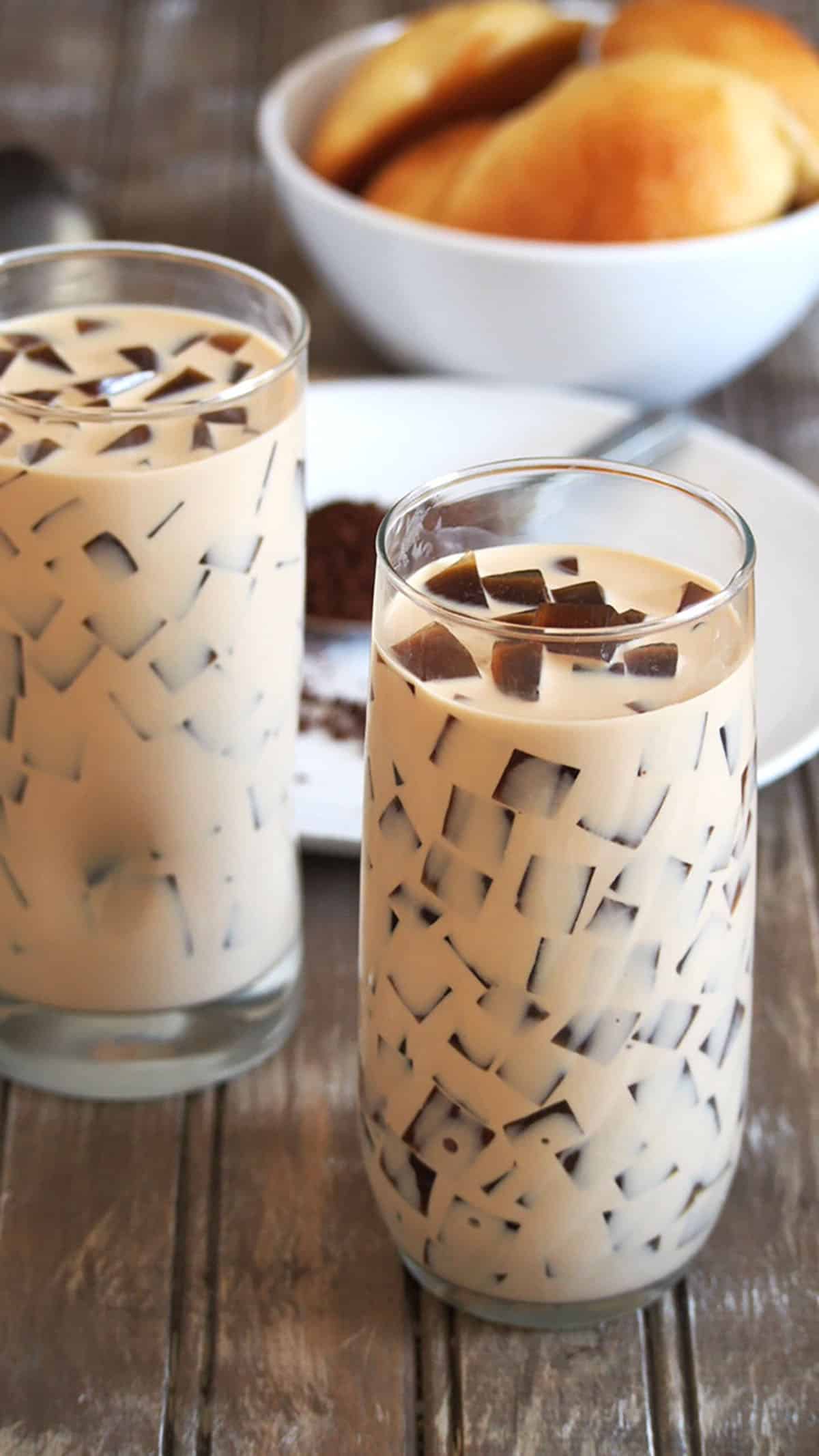 2 tall glasses of Coffee Jelly in a table.